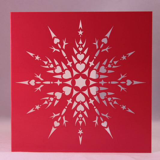 Laser Cut Snowflake Christmas Card. Snowflake With Hearts and Stars